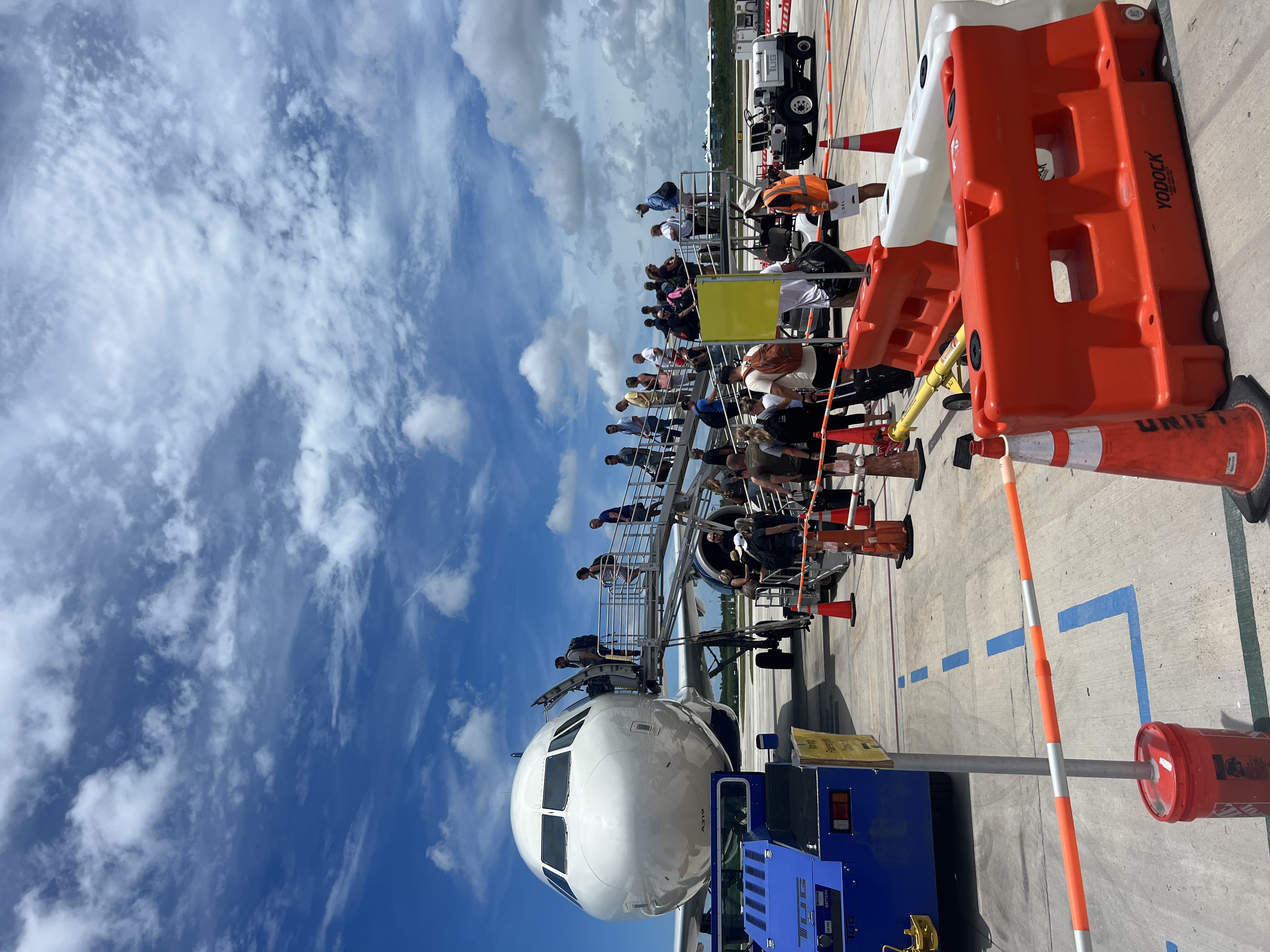 Passengers boarding a plane.